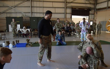 Airmen grapple in Clash of the Dragons