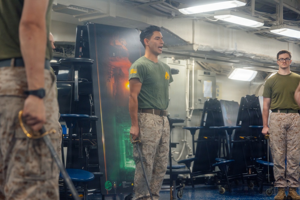 22nd MEU(SOC) | Corporals Course Sword and Guidon Drill Aboard USS Iwo Jima
