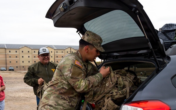 Newly graduated combat medics head home for the holidays