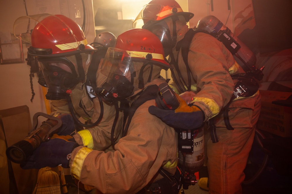 USS Iwo Jima Sailors Conduct a Damage Control Training  Evolution