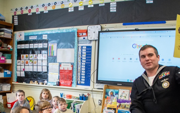 NTAG New England Sailor reads to Elementary School Students