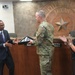 Maj. Gen. Curtis Taylor gives an American flag to the mayor of El Paso