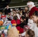First Lady Joins Marines in Toys for Tots Charity Event