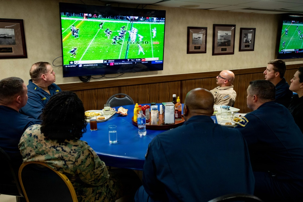 Boxer Watches the Army vs Navy Game