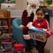 Santa spreads Toys for Tots cheer to students at Fred Ipalook Elementary School