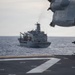 USS Tippecanoe Preforms a Replenishment at Sea with USS Tripoli