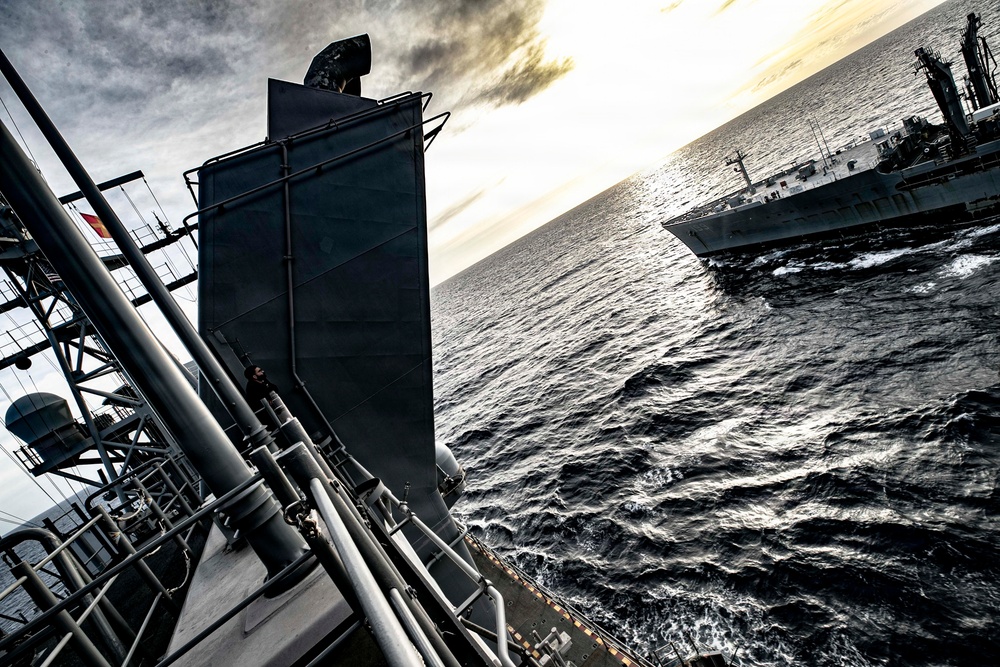 US Tripoli Conducts Replenishment-at-Sea with USNS Tippecanoe