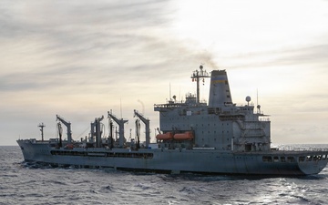 USS Tripoli Conducts Replenishment-At-Sea