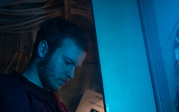 Sailor Repairs Door Aboard USS Tripoli