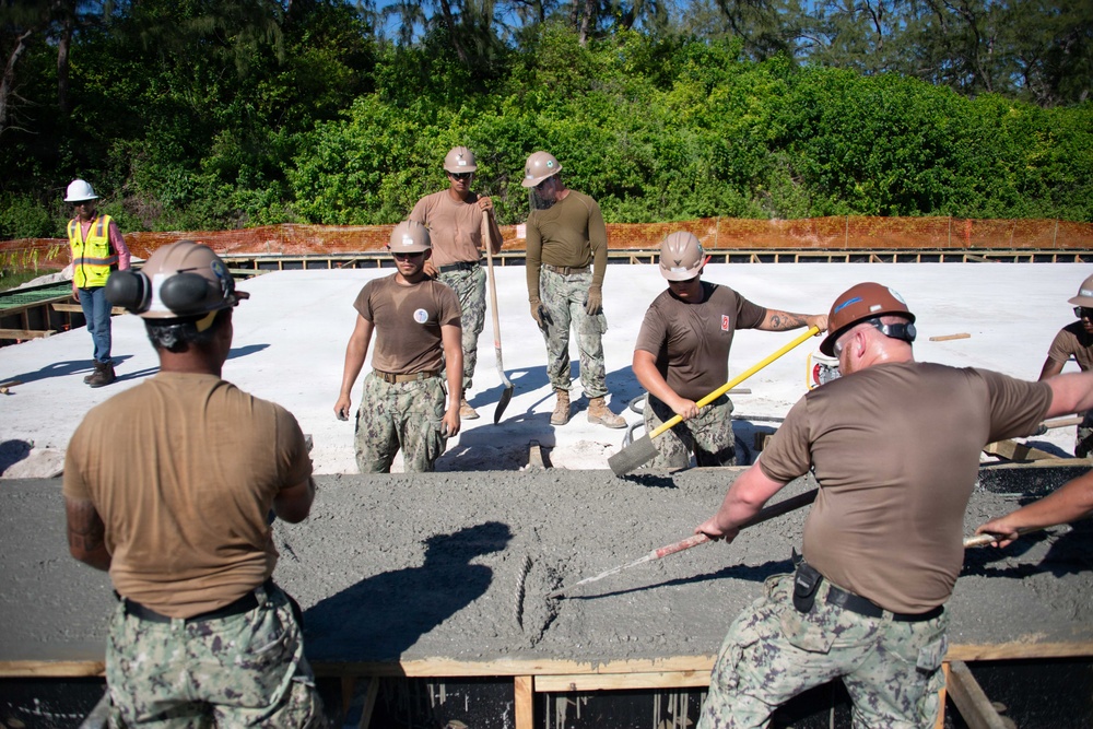 Seabees pour concrete for a Tension Fabric Structure construction project