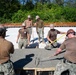 Seabees pour concrete for a Tension Fabric Structure construction project