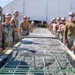 Seabees pour concrete for a Tension Fabric Structure construction project