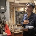 USS Mitscher (DDG 57) Sailor logs readings in engine room