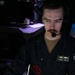 USS Mitscher (DDG 57) stands tactical action officer watch in ship combat direction center