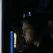 USS Mitscher (DDG 57) Officer stands watch in ship combat direction center