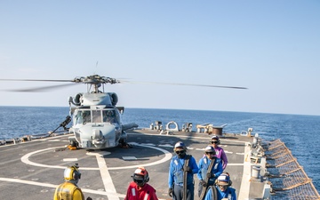 USS Mitscher (DDG 57) Sailors conduct refueling operations with HSM 79 Sea Hawk