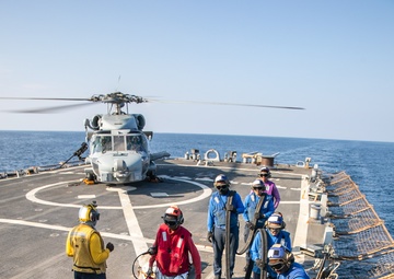 USS Mitscher (DDG 57) Sailors conduct refueling operations with HSM 79 Sea Hawk
