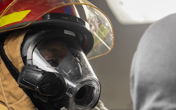 USS Mitscher (DDG 57) Sailors conduct general quarters drill