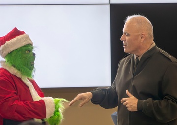 The Grinch Makes an Appearance at D.C. Armory’s Commanders Update Brief