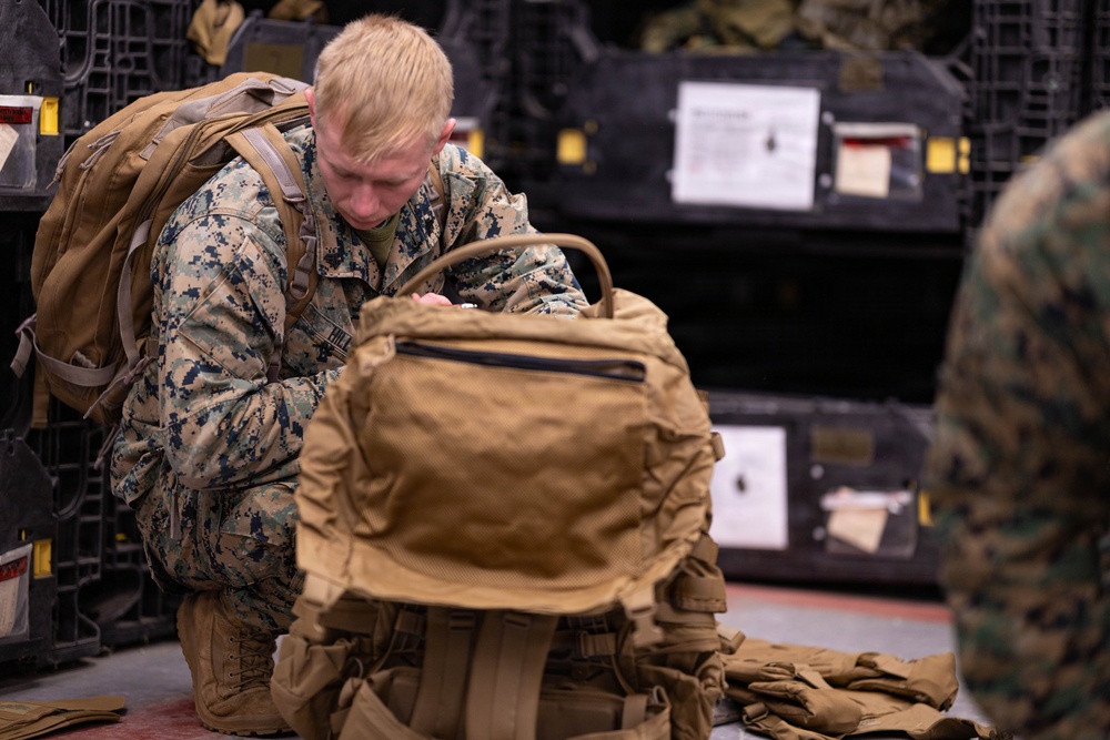 Reserve Marines with 25th Marine Regiment receive gear at Fort Devens