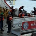 U.S. Coast Guard Cutter Mackinaw (WLBB 30) departs Cheboygan, Michigan