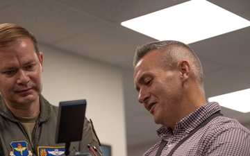 Boots on the Ground: Col. Kind Networked with the Communications Squadron Members in a Hands-On Tour