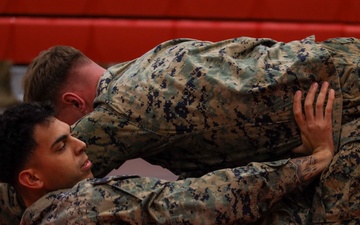 MBW Corporal's Course 1-26 participates in groundfighting PT