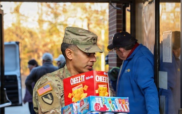 Volunteers spread holiday cheer to Fort Lee AIT Soldiers with 400 gift bags