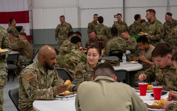All American Beef Battalion shares meal with deploying maintainers and their families