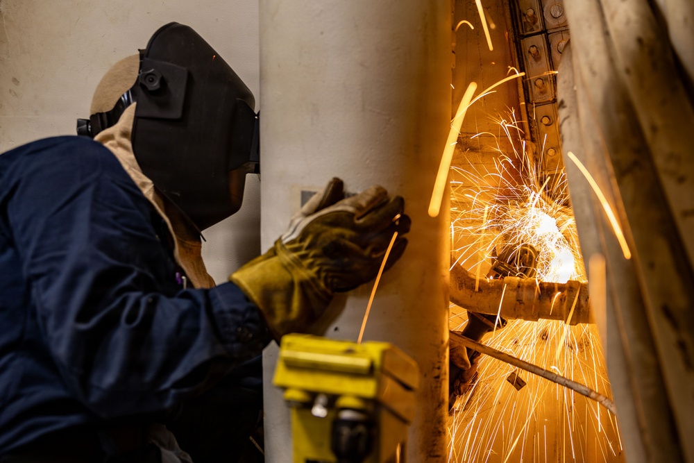 U.S. Sailor welds aboard USS San Antonio (LPD 17)
