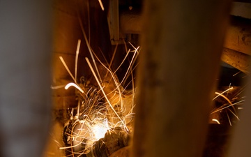 U.S. Sailor welds aboard USS San Antonio (LPD 17)
