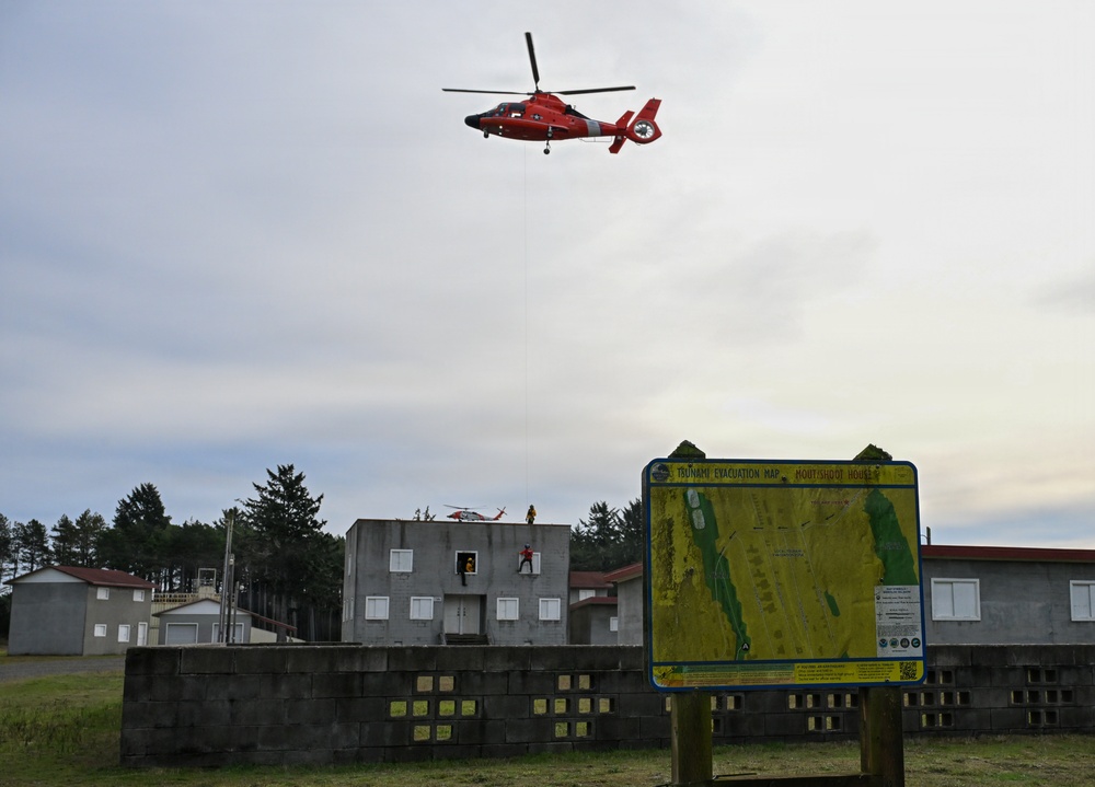 U.S. Coast Guard MH-60 Jayhawk and MH-65 Dolphin helicopter aircrews train as part of Advanced Helicopter Rescue School at the Camp Rilea Armed Forces Training Center in Oregon.