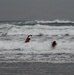 U.S. Coast Guard aviation survival technicians train as part of Advanced Helicopter Rescue School in Fort Stevens State Park, Oregon