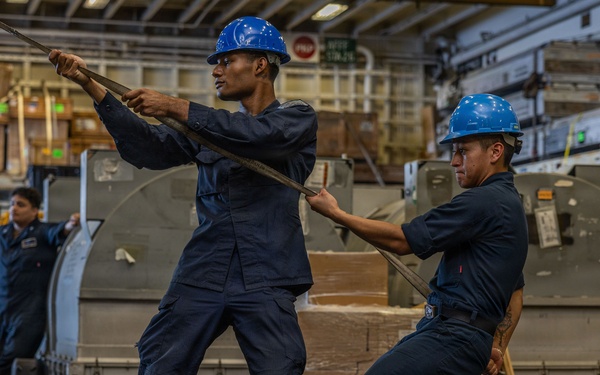 Iwo Jima Sailors Stow Aircraft Parts