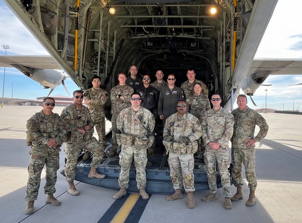 Soldiers and TXANG Airmen train together to load HIMARS onto C-130J