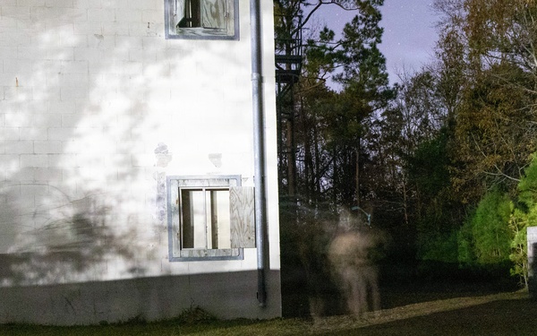 U.S Reconnaissance Marines with the 24th Marine Expeditionary Unit conduct room clearing drills as a part of Close Quarters Tactics training.