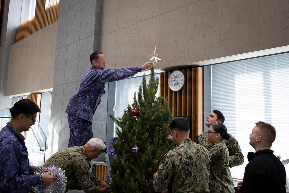 C7F and JMSDF Personnel Decorate a Tree