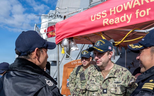 USS Howard (DDG 83) exchanges holiday gifts with sister ship JS Ikazuchi (DD 107)