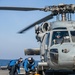 USS Mitscher (DDG 57) Sailors conduct flight operations with HSM 26 Sea Hawk