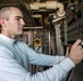 USS Mitscher (DDG 57) junior officer operates RAST system in LSO shack