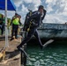 U.S. Navy and Panamanian services dive together during a Salvage Exercise