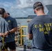U.S. Navy and Panamanian services dive together during a Salvage Exercise