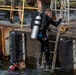 U.S. Navy and Panamanian services dive together during a Salvage Exercise