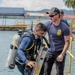 U.S. Navy and Panamanian services dive together during a Salvage Exercise