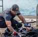 U.S. Navy and Panamanian services dive together during a Salvage Exercise