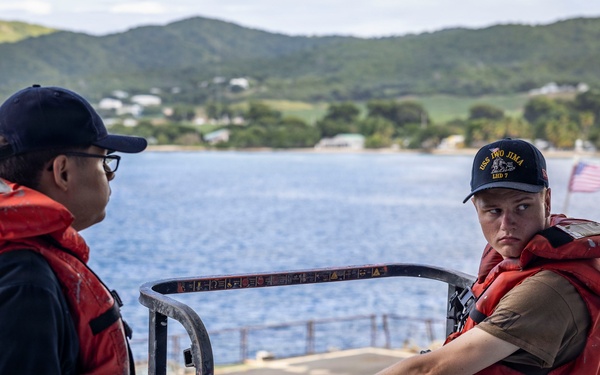 USS Iwo Jima Sailors Painting The Hull