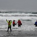 U.S. Coast Guard aviation survival technicians train as part of Advanced Helicopter Rescue School in Fort Stevens State Park, Oregon