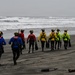 U.S. Coast Guard aviation survival technicians train as part of Advanced Helicopter Rescue School in Fort Stevens State Park, Oregon