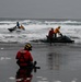 U.S. Coast Guard aviation survival technicians train as part of Advanced Helicopter Rescue School in Fort Stevens State Park, Oregon