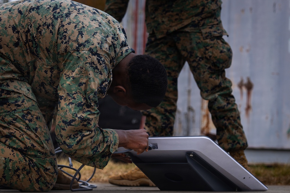 U.S. Marine Corps Satellite Transmissions System Operators Test-Out on Various Satellite Communication Systems